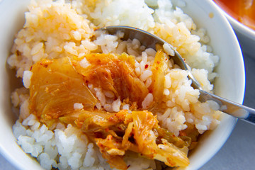 Korean Tuna kimchi stew which is called Chamchi Kimchi Jjigae with rice
