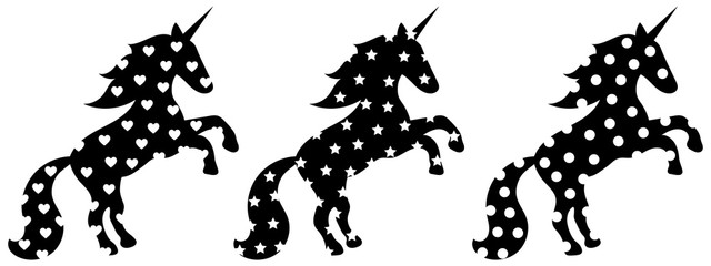 Set of three black cartoon silhouettes of unicorn horses rearing up, with flowing manes and holes / pattern in the form of hearts, stars and circles. White background. Vector graphics, illustration