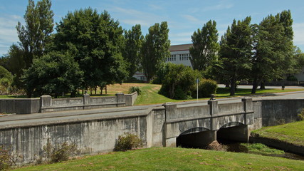 Fototapeta na wymiar Bridge over Otepuni Stream in Otepuni Gardens in Invercargill,Southland on South Island of New Zealand