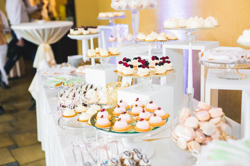 Delicious wedding reception candy bar dessert table