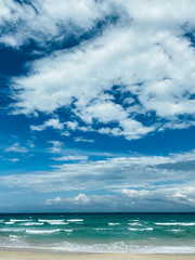 Naklejka na ściany i meble Blue sky with white clouds background. Clear sunny day