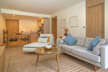 Sofa and day bed in living room of villa