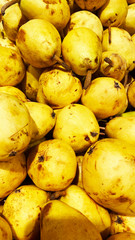 Yellow fresh delicious ripe pear pile close-up, fruit pear close-up for background, healthy snack, diet