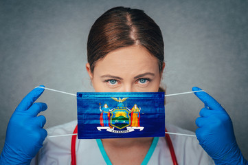 Coronavirus in U.S. State New York, Female Doctor Portrait, protect Face surgical medical mask with...