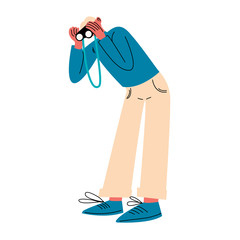 Young man traveler standing and looking at binoculars vector illustration
