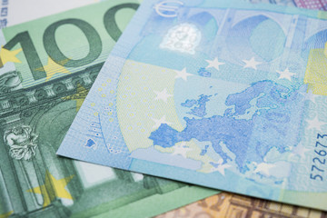 Macro shot focus on England in Europe map on money cash euro banknote background. The currency of the euro country area and institutions. European Union ( EU) financial economic or UK brexit concept.