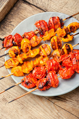 Skewers of tomatoes.