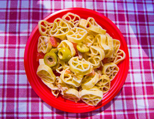 pasta with colorful and nutritious vegetables and with capers
