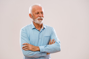 Portrait of senior man who is looking away.