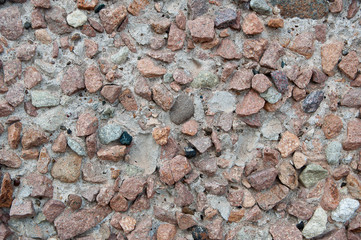 texture of small stones and cobblestones on the road