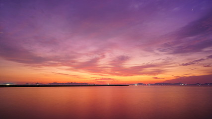 Beautiful evening and colorful sunset sky over sea