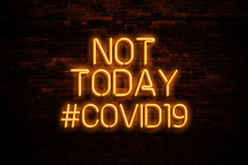 Fototapeta na wymiar Not Today Covid19 text with Neon Lights on the wall