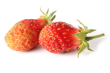 Two strawberries isolated on white