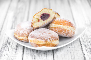 Fresh Berliner Doughnuts as detailed close-up shot (selective focus)