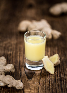 Portion of Ginger Juice as detailed close-up shot; selective focus