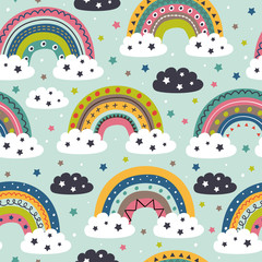seamless pattern with colorful rainbow and clouds on blue background   - vector illustration, eps    