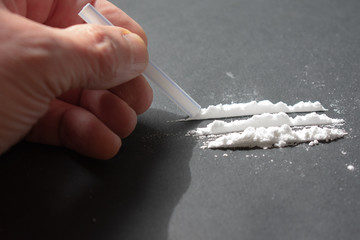 Snorting a line of cocaine