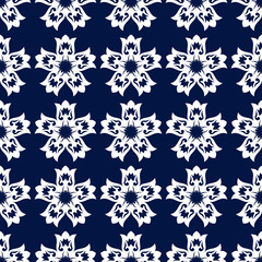 Floral seamless pattern. White design on deep blue background
