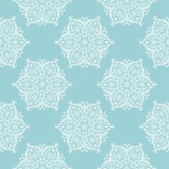 Seamless pattern in indian style. Blue and white background