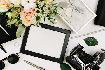 Blank wedding invitation cards mockups with vintage bouquet, old camera and black leather notebook...