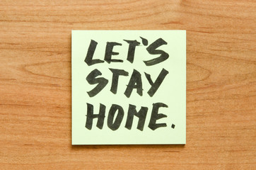 Obraz premium Stay at home and be safe. Self isolation and quarantine campaign to protect yourself and save lives. Handwritten. - Image