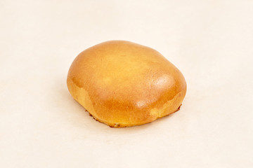 Homemade pie square shaped pastry with filling. Closeup on a light background