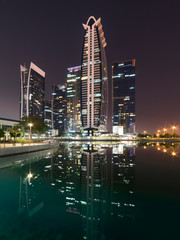 Obraz premium View from Lake to Skyscrapers, Emirates, Dubai, Jumeirah Lakes Towers, Dec.2017