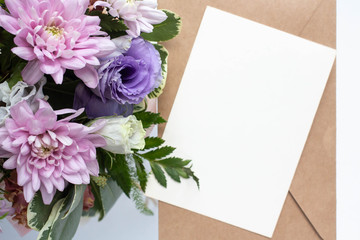 card mockup with delicate bouquet in a ceramic vase. chrysanthemums and eustomas. floral background