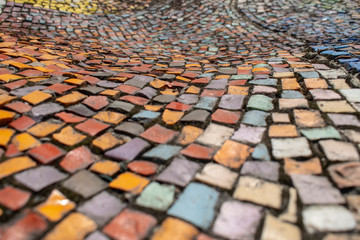 Abstract photo with colored granite mosaic with bluer and bokeh. Abstract colored wavy background.