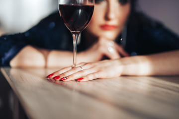 beautiful luxury woman with glass red wine indoor, sun light