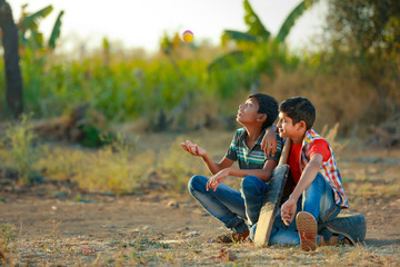 Rural Indian Child Playing Cricket