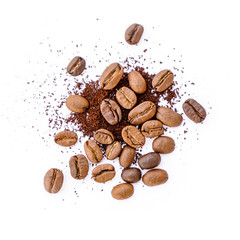 Roasted coffee beans with ground coffee on white background 