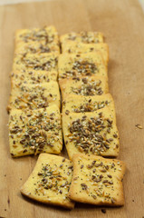 Making gluten free maize and rice flour cookies with poppy seeds, sesame and flaxseed