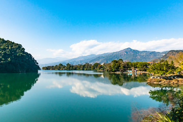 Naklejka premium View at Annapurna mountain range in Phewa lake in Pokhara, Nepal
