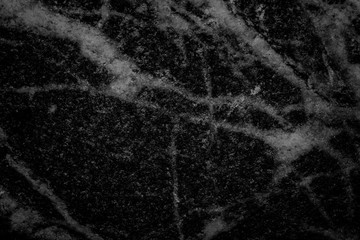 Black background of a stone texture with veins - Dark stage background