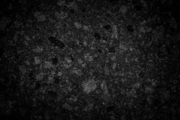 Fototapeta na wymiar Black background of a stone texture - Dark stage background