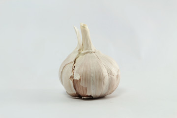 Organic garlic on white background.