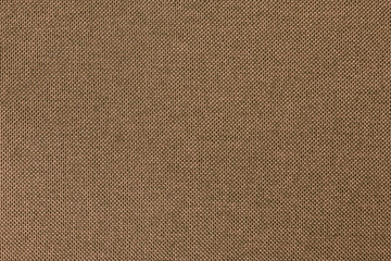 Dark brown fabric texture for background and design art work with seamless pattern of natural textile.