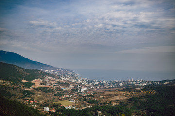 Fototapeta na wymiar Panoramic landscape. View of the Yalta mountain-forest nature reserve. Republic of Crimea.
