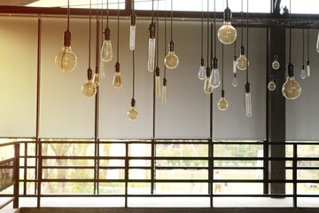 Interior decoration with hanging lights inside the coffee shop.