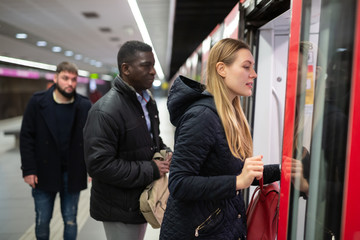 Girl landing in subway train