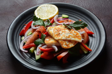 Cabbage rolls stuffed with ground beef and rice in tomato sauce