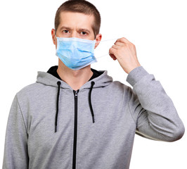 Sports man in hooded dress medical mask on face isolated