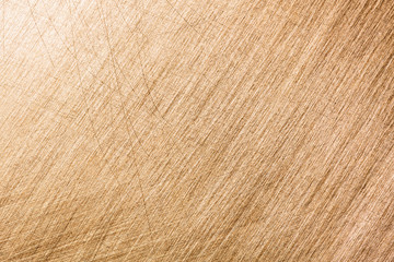 scratched copper metal sheet textured background in high resolution