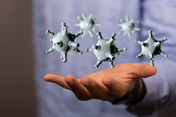 Hologram of coronavirus COVID-2019 on a blue futuristic background. Deadly type of virus 2019-nCoV....