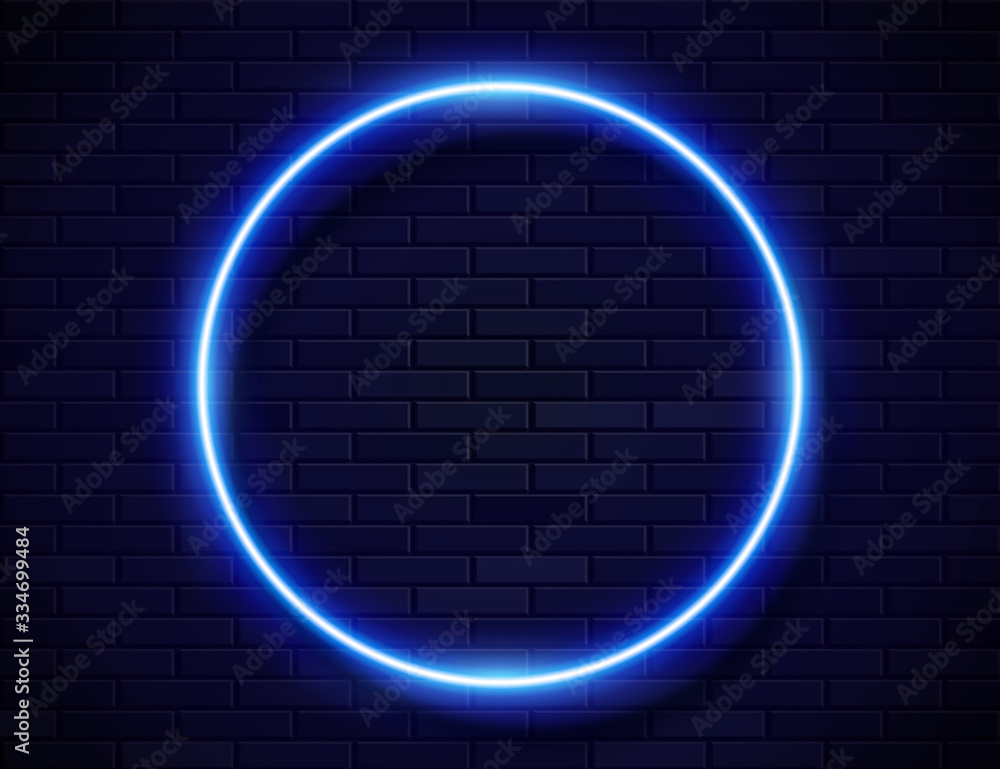 Wall mural neon glowing circle blue frame for banner on dark empty grunge brick background