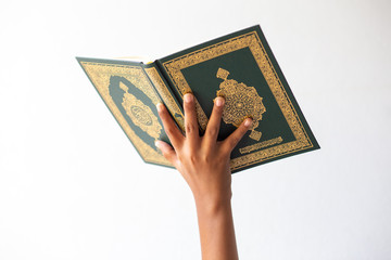 Quran - holy book of Muslims religion, Concept: open book holy prayers for god,Friday In the month...