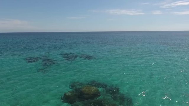 aerial view overflying crystal clear deep waters of Mediterranean Sea