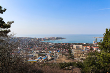 Hiking in the mountains and a view of the center of the resort city of Gelendzhik and the Bay. Black sea coast. Spring 2020