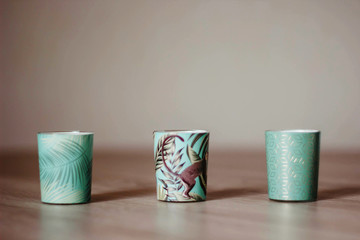 cups on wooden table